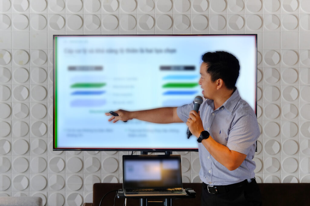 MSc. Le Tuan Viet sharing waterproofing and tile installation during technical training
